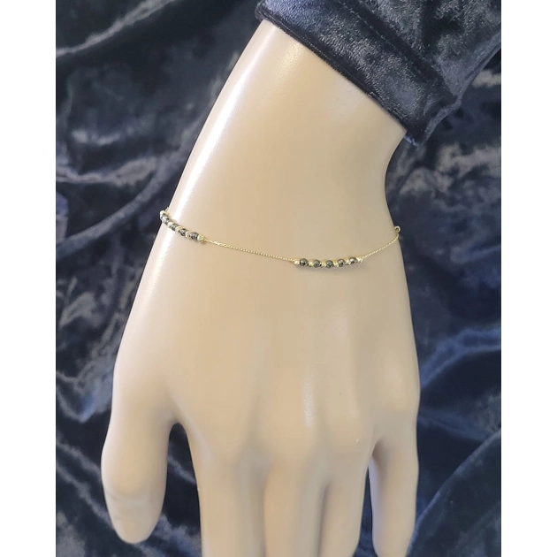 Elegantiška moteriška geltono aukso apyrankė su juodais cirkoniais 585